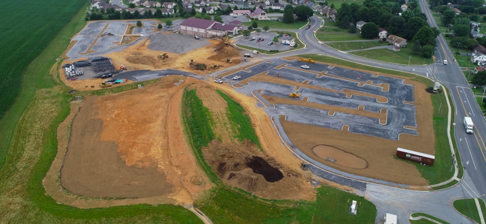 Drone view of cleared fields for new parking lot