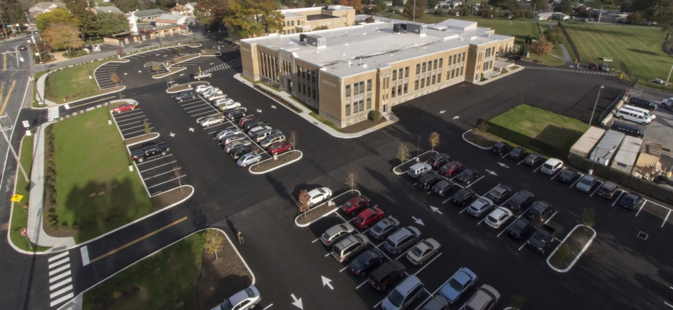 Drone view of elementary school and parking lot