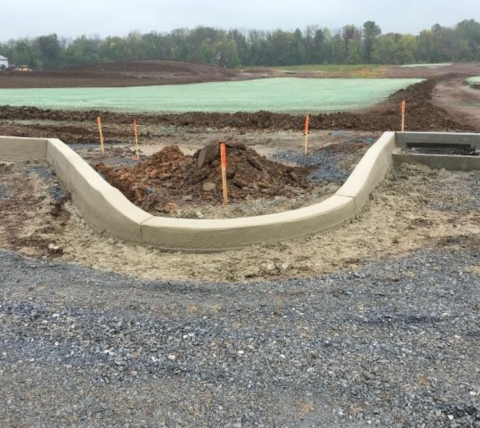 new curb installation at construction site