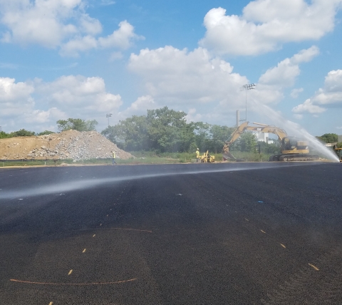 watering in-progress turf field