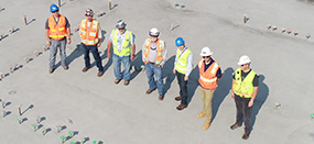 construction workers standing on jobsite
