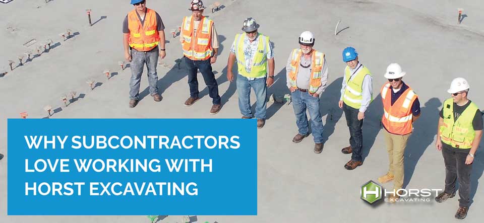 construction workers standing on jobsite