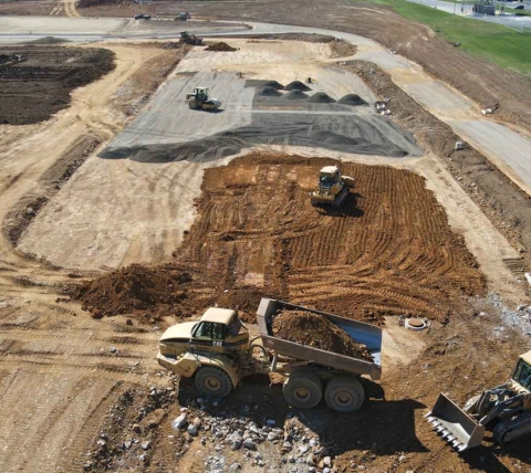 excavating equipment working on active jobsite