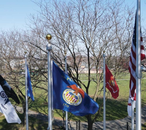 flags flying above manheim veterans memorial